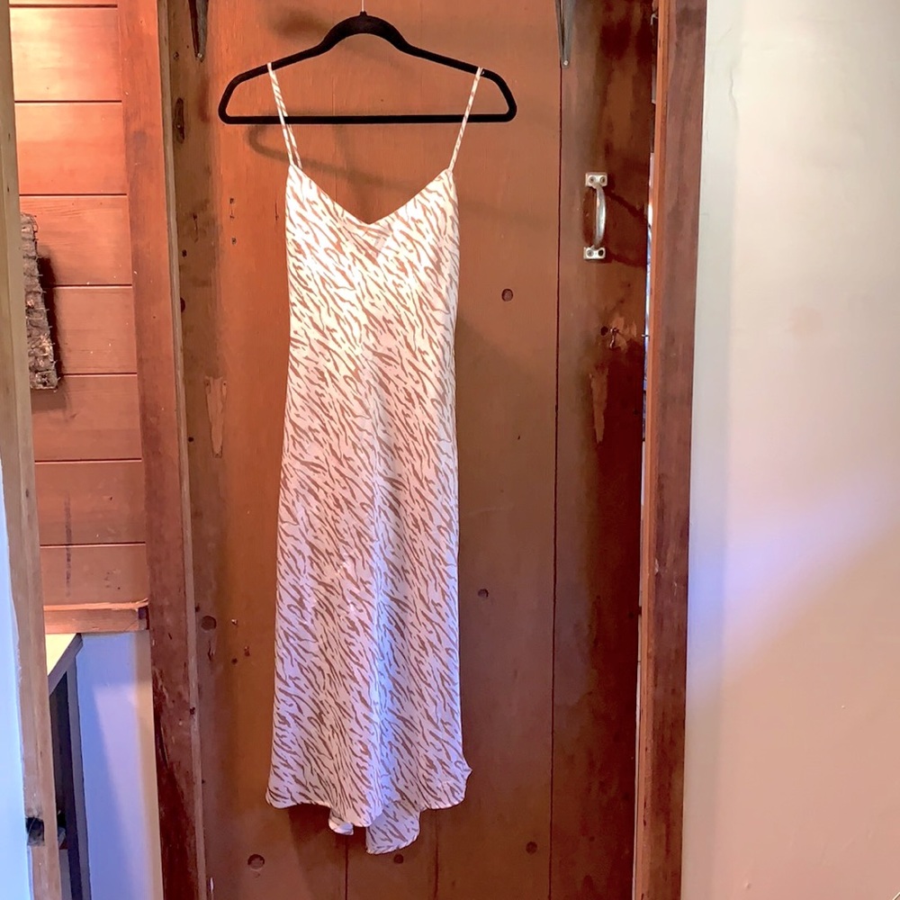 Beautiful Abercrombie & Fitch silk dress. White with tan zebra stripes